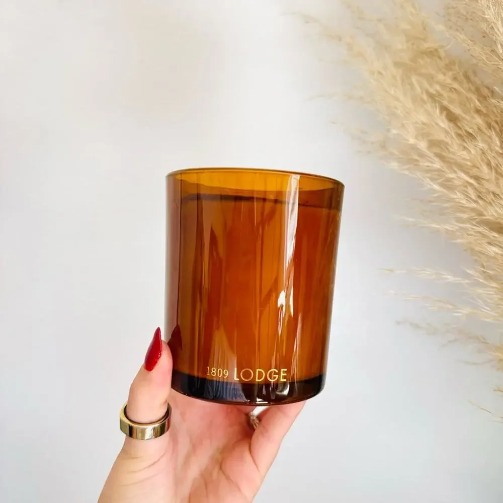 NEW FP FREE PEOPLE Amber Rust Glass Vessel Lodge Palo Santo $48 Scented Candle